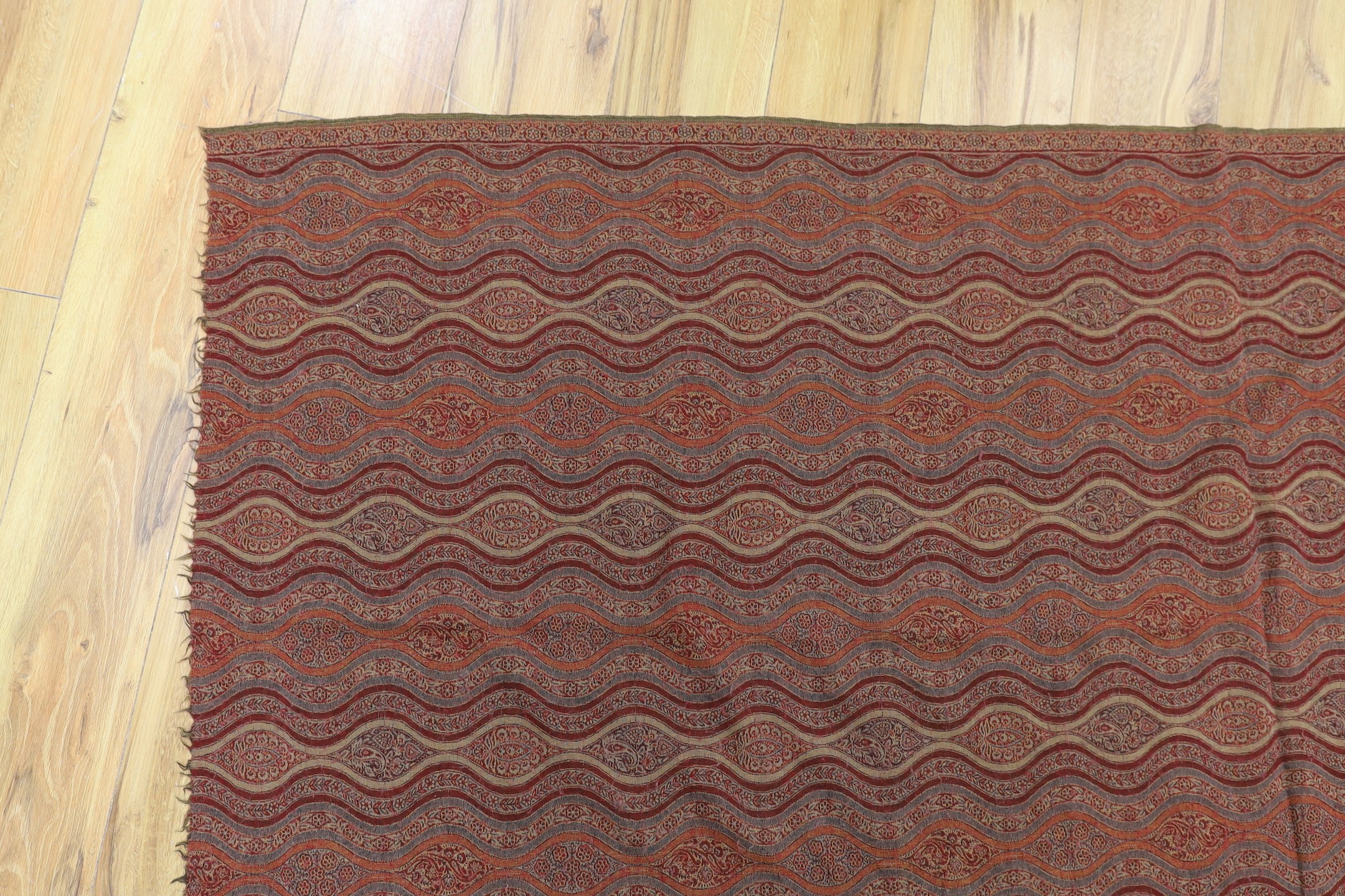 An Indian paisley shawl, 200 cms x 104 cms